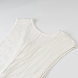 Close-up of white ribbed knit fabric texture and high-quality stitched neckline detail