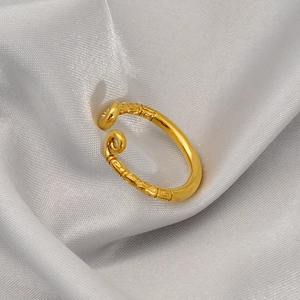 Vintage golden Sun Wukong open ring with traditional cloud patterns on silk background