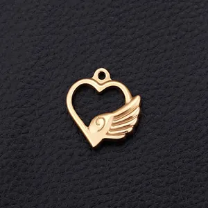 Gold stainless steel heart-shaped pendant with detailed wing design on black leather