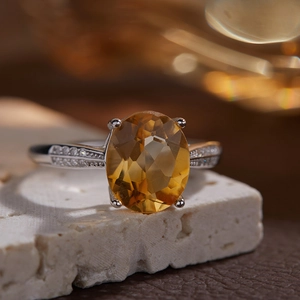 Elegant S925 sterling silver ring featuring a bright oval citrine and side diamonds