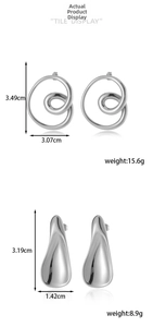 Detailed view of silver geometric earrings with precise dimensions and weight measurements