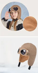 Detail of warm khaki aviator hat with fleece lining and goggles for kids