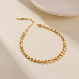 18K gold plated stainless steel bracelet with small linked hearts and lobster clasp