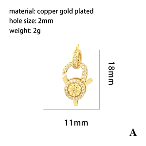 Detailed macro of 18k gold plated copper charm with micro paved zircon flower design