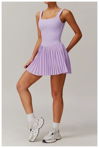 Lavender purple sleeveless tennis dress with square neck and pleated skirt detail