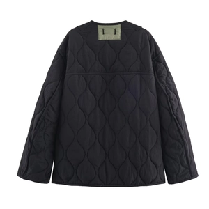Black reversible quilted jacket with a padded back view on a clean white background