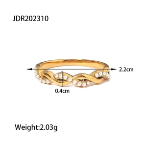 Detailed view of gold twisted ring with pearl showing size dimensions and 2.03g weight
