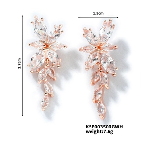 Detailed view of rose gold flower tassel earrings with zircons measuring 3.7cm by 1.5cm