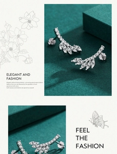 Macro shot of S925 sterling silver leaf earrings with marquise-cut cubic zirconia