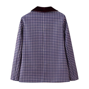 Detail of vintage plaid blazer back with burgundy velvet collar and stitching