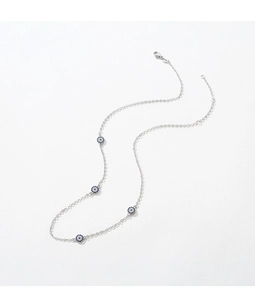 Macro view of S925 silver Evil Eye necklace with blue and clear zircon pendant detail