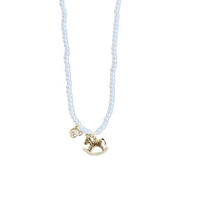 Elegant white pearl necklace with gold rocking horse pendant and pavé zircon charm