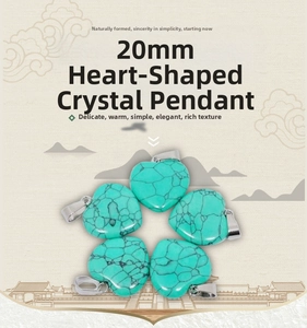 Macro view of five 20mm turquoise heart pendants with silver metal clasps for DIY jewelry