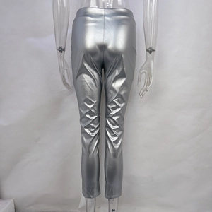 Rear view of silver high-waisted PU leather pants with a sleek metallic finish and slim fit
