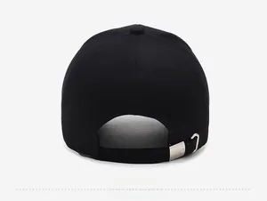 Adjustable silver metal buckle detail on back of black embroidered baseball cap