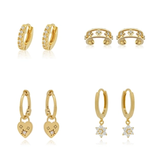 Detail view of 24K gold plated earrings set with cubic zirconia and S925 hallmarks