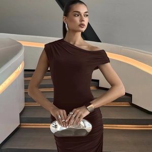 Detailed view of the dark brown off-shoulder dress featuring slim-fit ruched texture