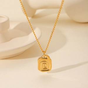 18K gold plated stainless steel necklace featuring a vintage spiral texture organic pendant