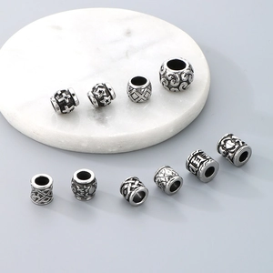 Vintage stainless steel barrel beads with cross and star patterns for DIY bracelets