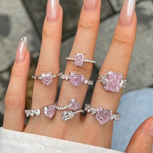 Luxurious S925 sterling silver ring featuring heart and pear cut pink zirconia stones