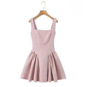 Detail shot of a pink sleeveless dress with wide shoulder straps and square neckline on a hanger