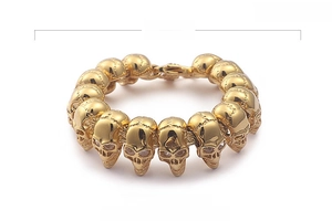Détail du bracelet tête de mort plaqué or 18K avec dimensions 220x23mm et poids 114g