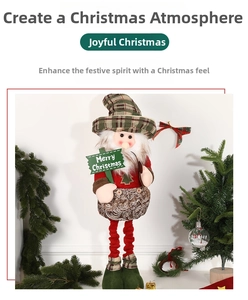 Close-up of a festive Christmas gnome doll holding a Merry Christmas sign on a holiday shelf