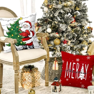 Christmas pillow covers featuring Santa and festive text in a cozy holiday home setting