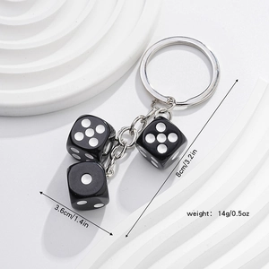 Black dice keychain with metal ring and three resin cubes shown with size measurements