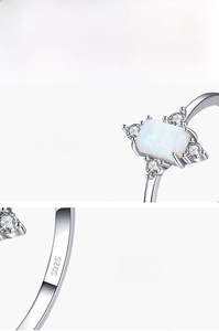 Detailed macro view of S925 sterling silver hallmark and rectangle opal stone ring