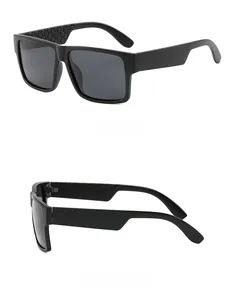 Detail of classic black square sunglasses featuring textured geometric pattern on wide temples