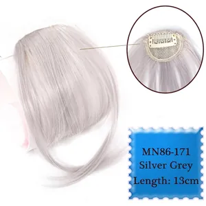 Detail view of silver grey air bangs hairpiece with 13cm length and secure metal clips