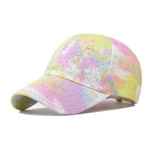 Tie-dye baseball cap with colorful bear rhinestones and vibrant gradient patterns