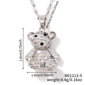 Detailed view of micro-pave bear pendant with dimensions 1.9cm height and 1.4cm width