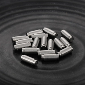 Macro shot of stainless steel stepped pins with brushed finish for precision machines