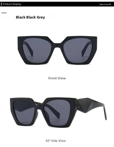 Detail view of black geometric oversized sunglasses with 3D faceted temple design