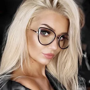 Chic cat-eye anti-blue light glasses with gold metal temples on a fashion model