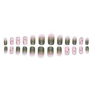 Summer green camellia press-on nails with long round shape and glitter gradient