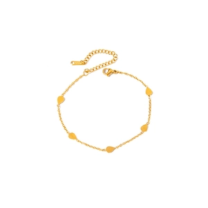 Detailed shot of gold plated bracelet featuring polished water drop pendants and lobster clasp