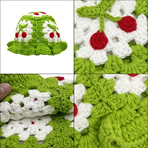 Handmade crochet bucket hat for kids featuring green knit and cute cherry embroidery