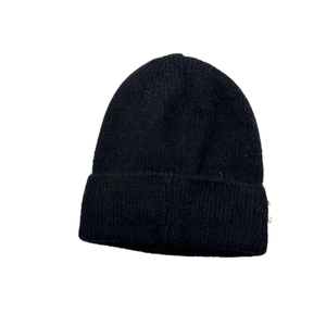 Detailed view of the ribbed knit pattern and wide folded brim of the black winter beanie