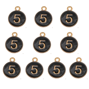 Detail view of ten black enamel round pendants with golden number five for DIY jewelry