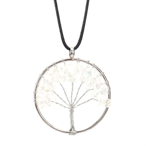 Detail of handmade wire wrapped Tree of Life pendant with white crystal stones