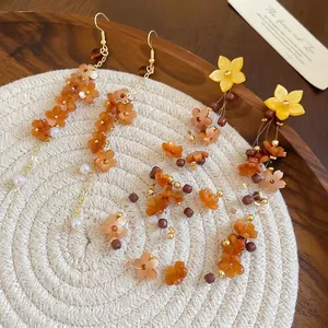 Resin flower and pearl tassel earrings with gold hooks for beach vacation style