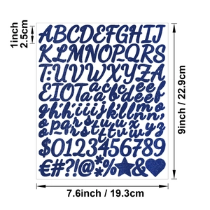 Macro detail of 1-inch blue glitter alphabet stickers with sparkling sand texture
