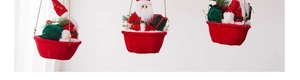 Three hanging Santa Claus ornaments with sequins and gift baskets for Christmas decor