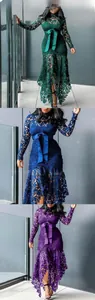 Detailed lace floral pattern of long sleeve high neck dress in green blue and purple