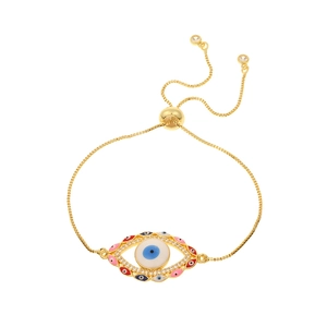 Detail of gold evil eye bracelet featuring colorful enamel eyes and adjustable sliding clasp