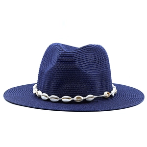 Classic navy blue straw fedora hat featuring a white shell decorative band for beach sun protection