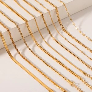 18K gold plated stainless steel chain collection including snake and figaro styles